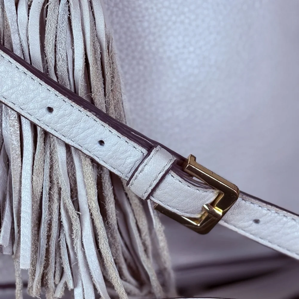 G.I.L.I. Got It. Love It. White Pebbled Leather Drawstring Hobo Tassel